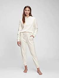 Smotanové dámske pyžamové nohavice cozy rib joggers GAP
