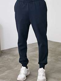 Tmavomodré pánske tepláky Trendyol